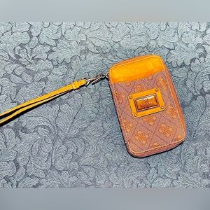 Guess wallet with floral interior and removable strap